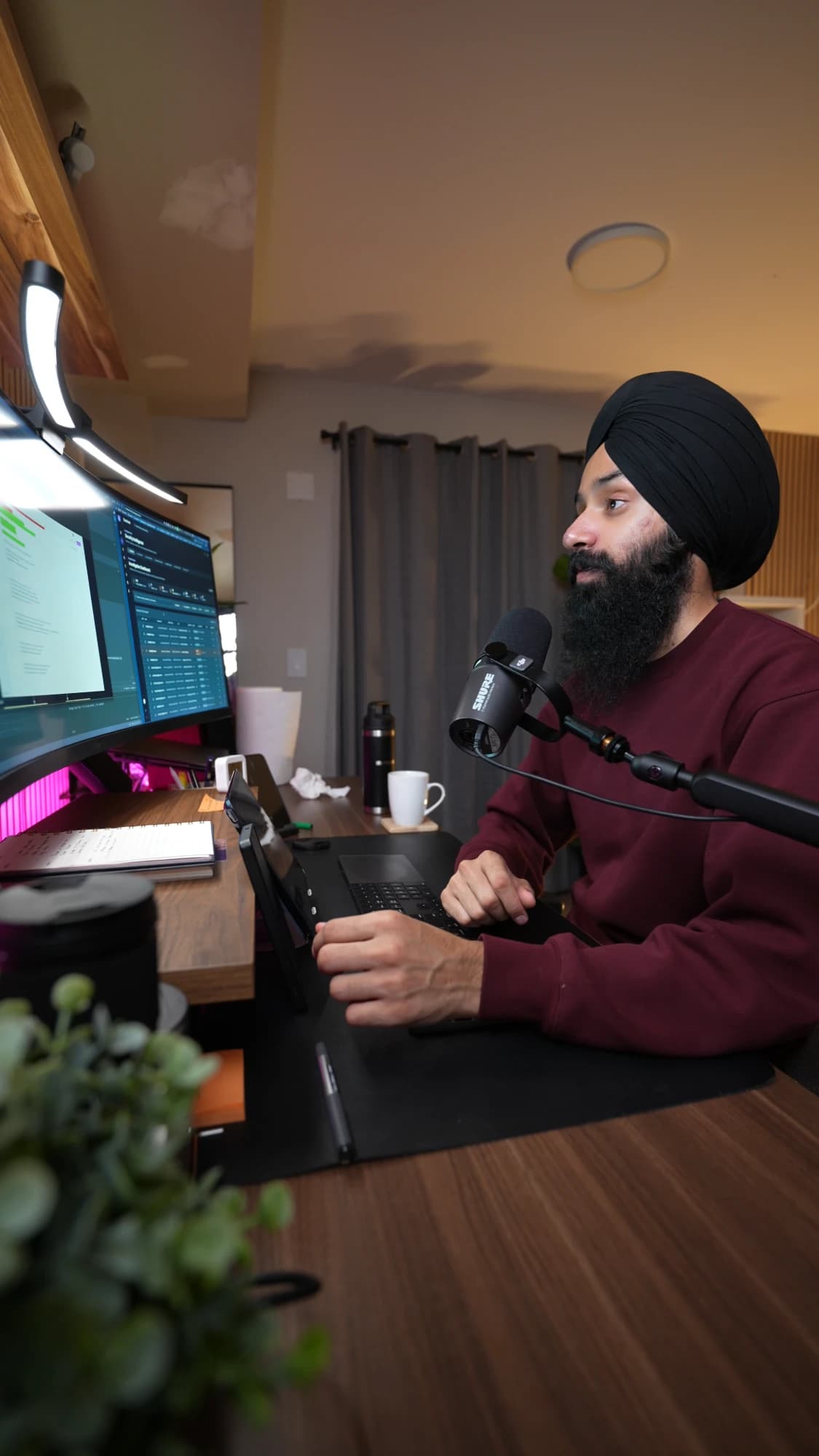 Parveen Singh working at his desk